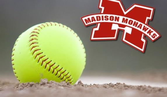 Softball in dirt with Madison Mohawks logo